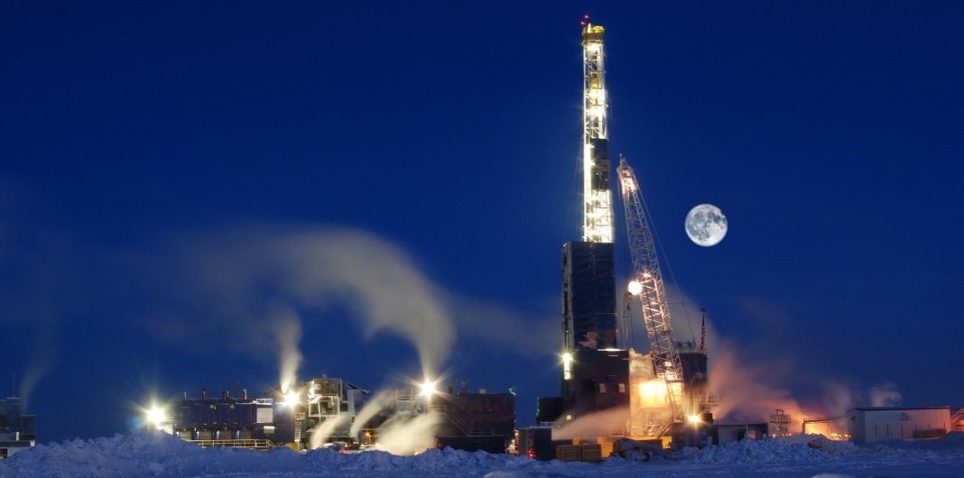 North Slope Pumpjack with moon in the background